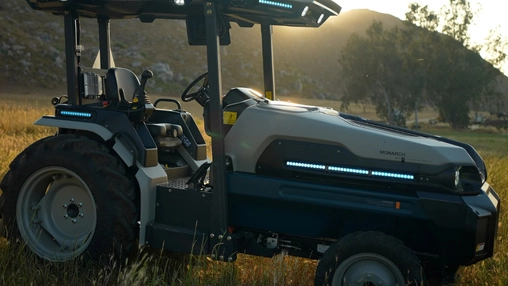 Electric smart tractor in field symbolizing Monarch and DFA dairy tech partnership