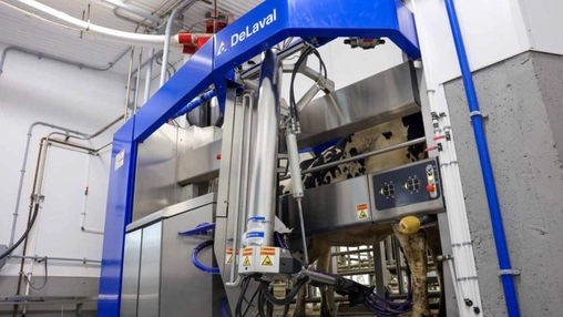 DeLaval automated milking system with sensors detecting dairy cow health issues